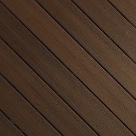A close up of a wooden deck with diagonal lines.