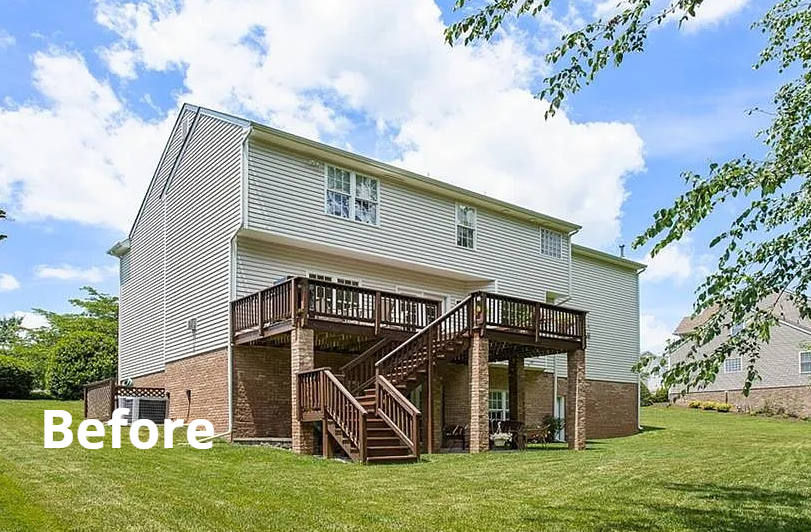 A before picture of a house with a deck and stairs.