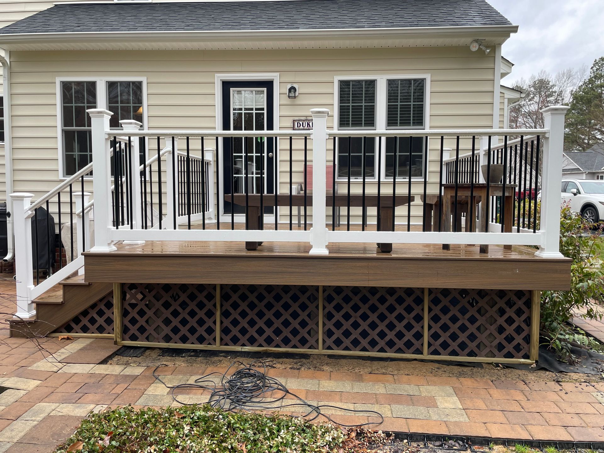 Beautifully Lit Outdoor Oasis Fence with Stairs | Richmond, VA | Bon Air Exteriors