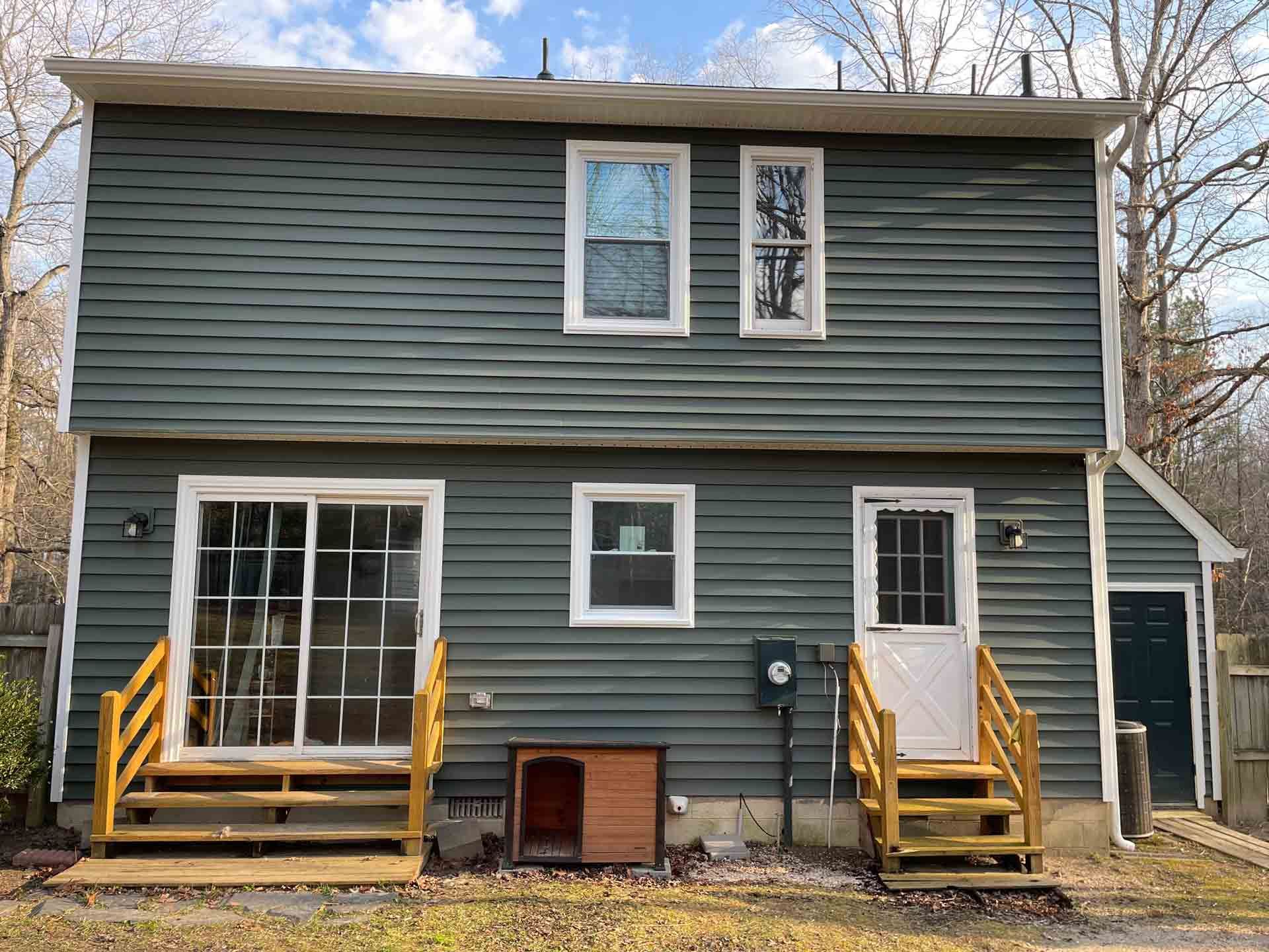 Back of a House with a Dog House in Powhatan | Richmond, VA | Bon Air Exteriors