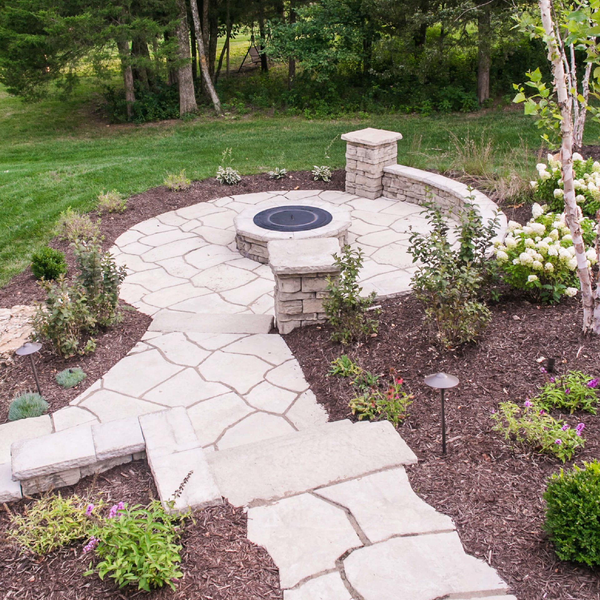 stone walkway and fire pit