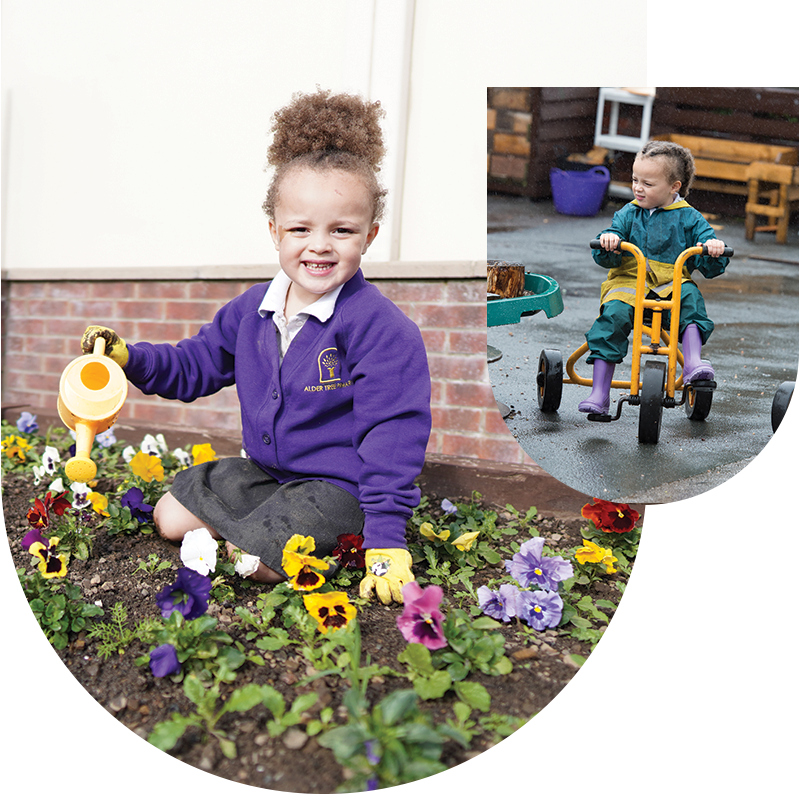 A little girl in uniform is watering flowers