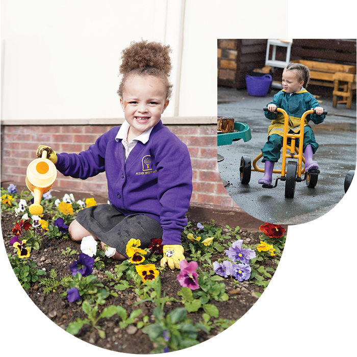 A little girl in uniform is watering flowers