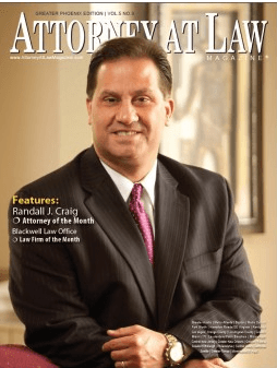 A man in a suit and tie is on the cover of an attorney at law magazine