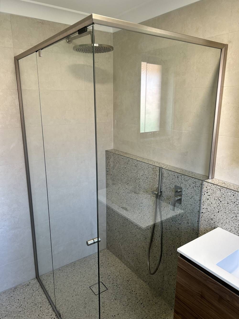 A Bathroom With a Shower Stall and a Sink — Browny's Glass & Aluminium in Wingham, NSW