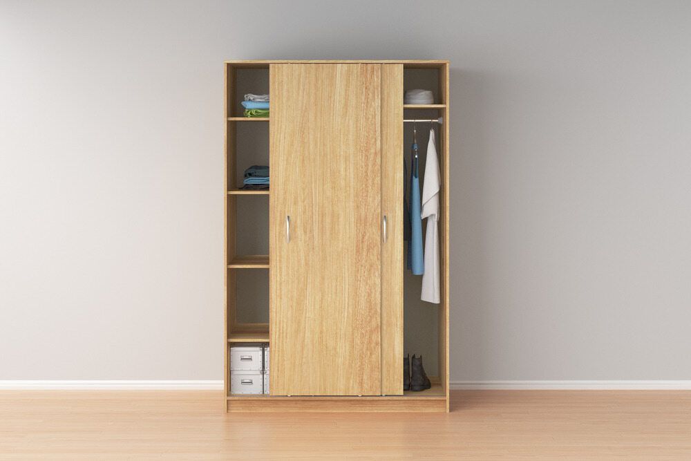 A Wooden Wardrobe With Sliding Doors And Shelves In A Room — Browny's Glass & Aluminium in Wingham, NSW