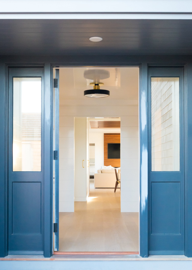 Entryway to house with blue door