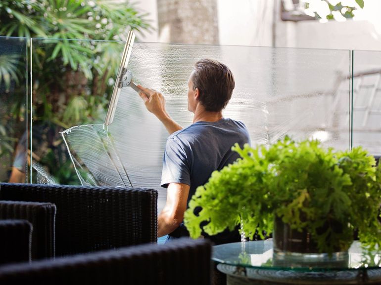 wiping glass fence panels