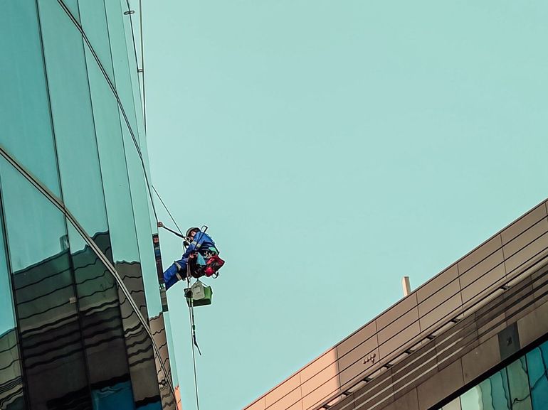 cleaning windows in buildings