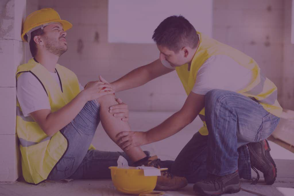 A man is helping another man with his knee.