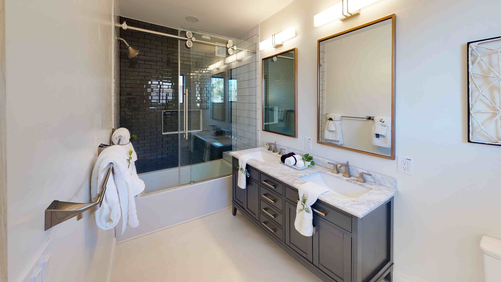 one of the bathroom vanities made with a quality wood species and great hardware by our general contractor