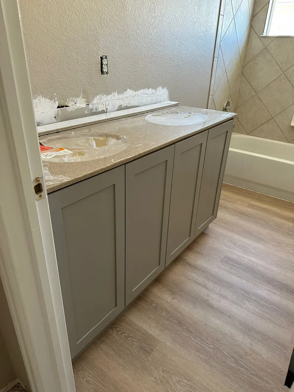 Stylish new shiny white kitchen cabinets