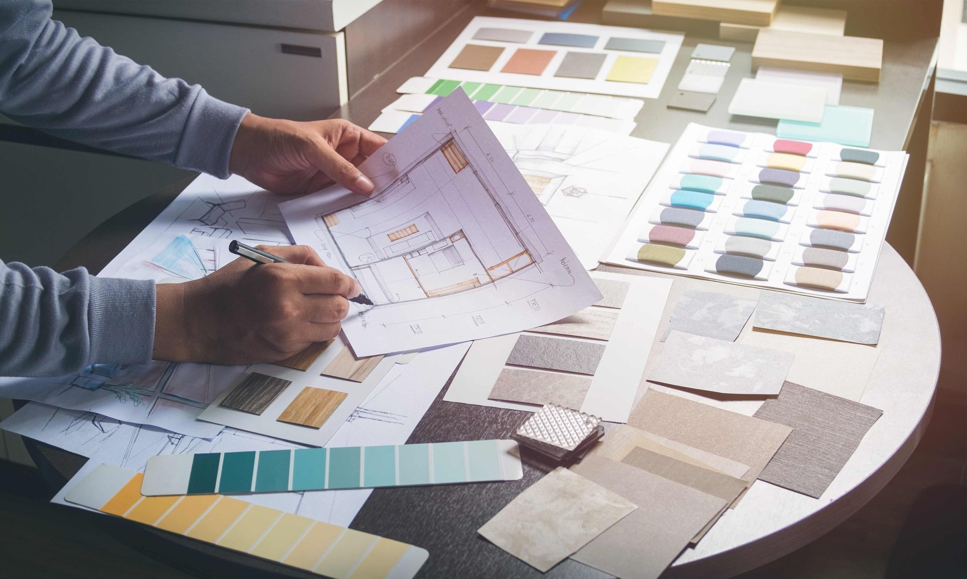 A man looking at remodeling plans