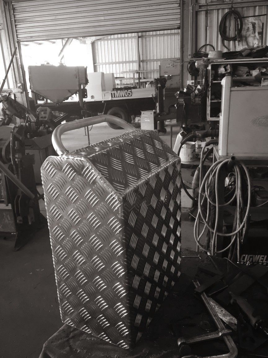 A Black And White Photo Of A Metal Box In A Garage — Tinman's Welding Worx In Sarina, QLD