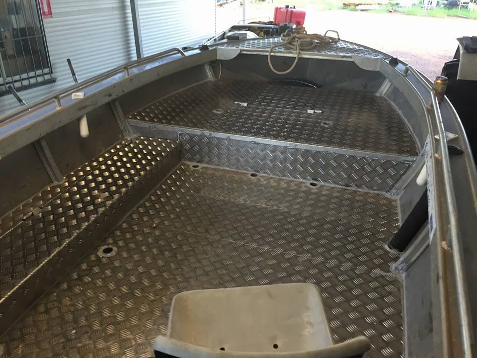 The Inside Of A Boat With A White Seat — Tinman's Welding Worx In Sarina, QLD