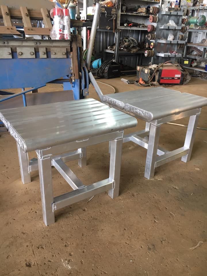 Two Aluminum Stools Are Sitting Next To Each Other In A Garage — Tinman's Welding Worx In Sarina, QLD