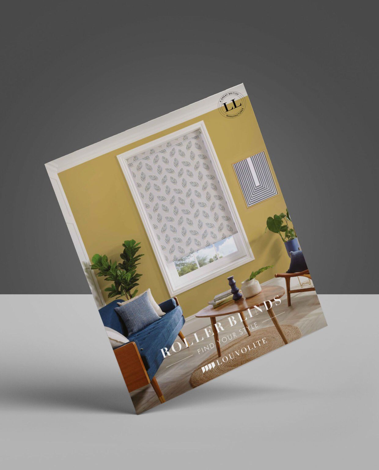 A brochure for roller blinds is sitting on a table.