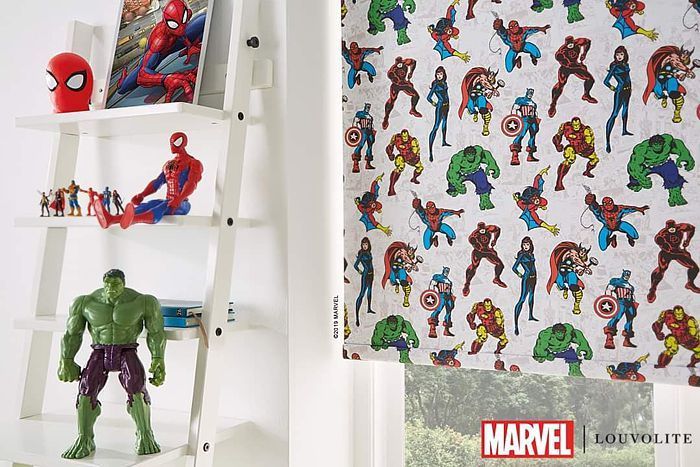 A toy hulk is sitting on a shelf next to a ladder.