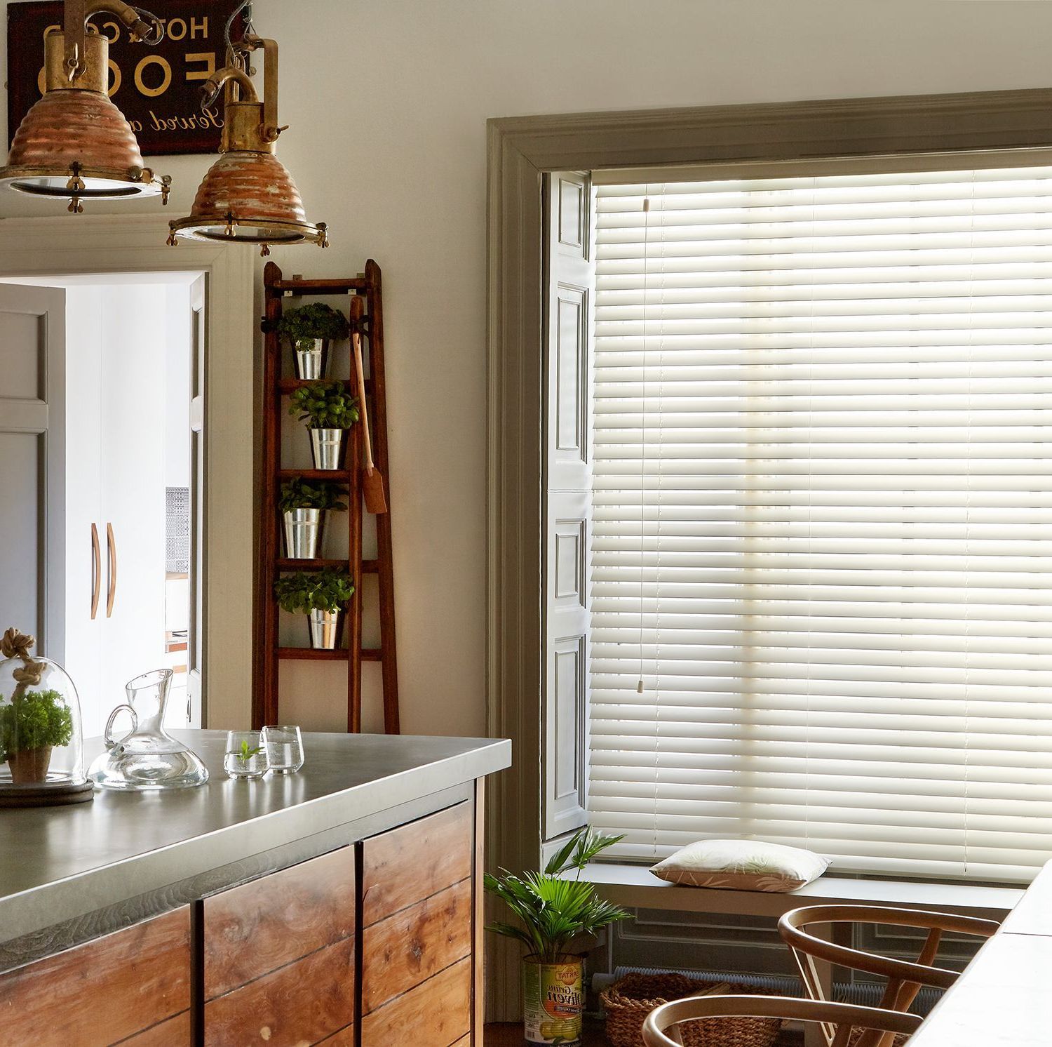 A kitchen with a sign that says meow on it