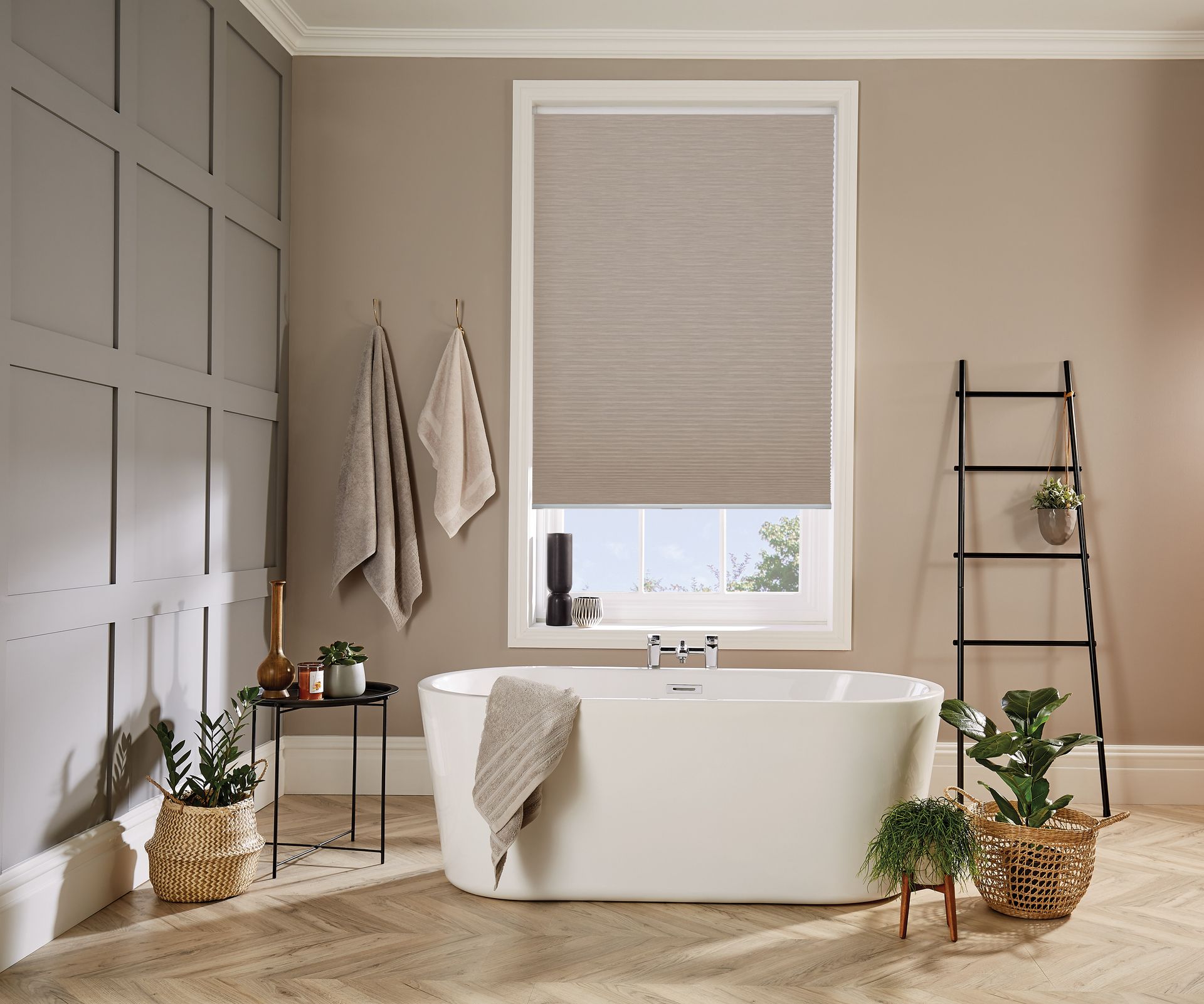 A bathroom with a bathtub and a window with blinds.
