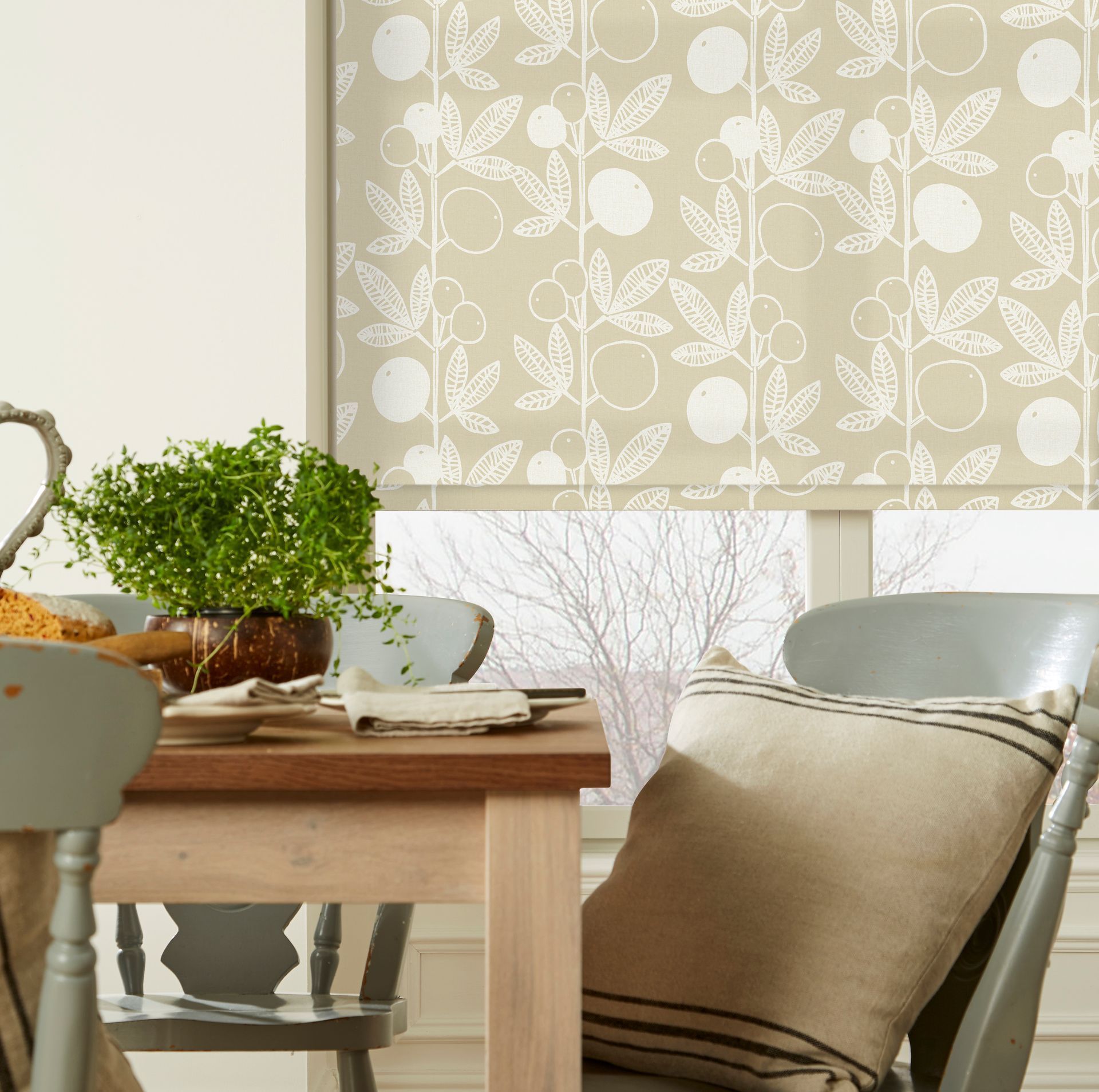 A dining room table with a pillow on it