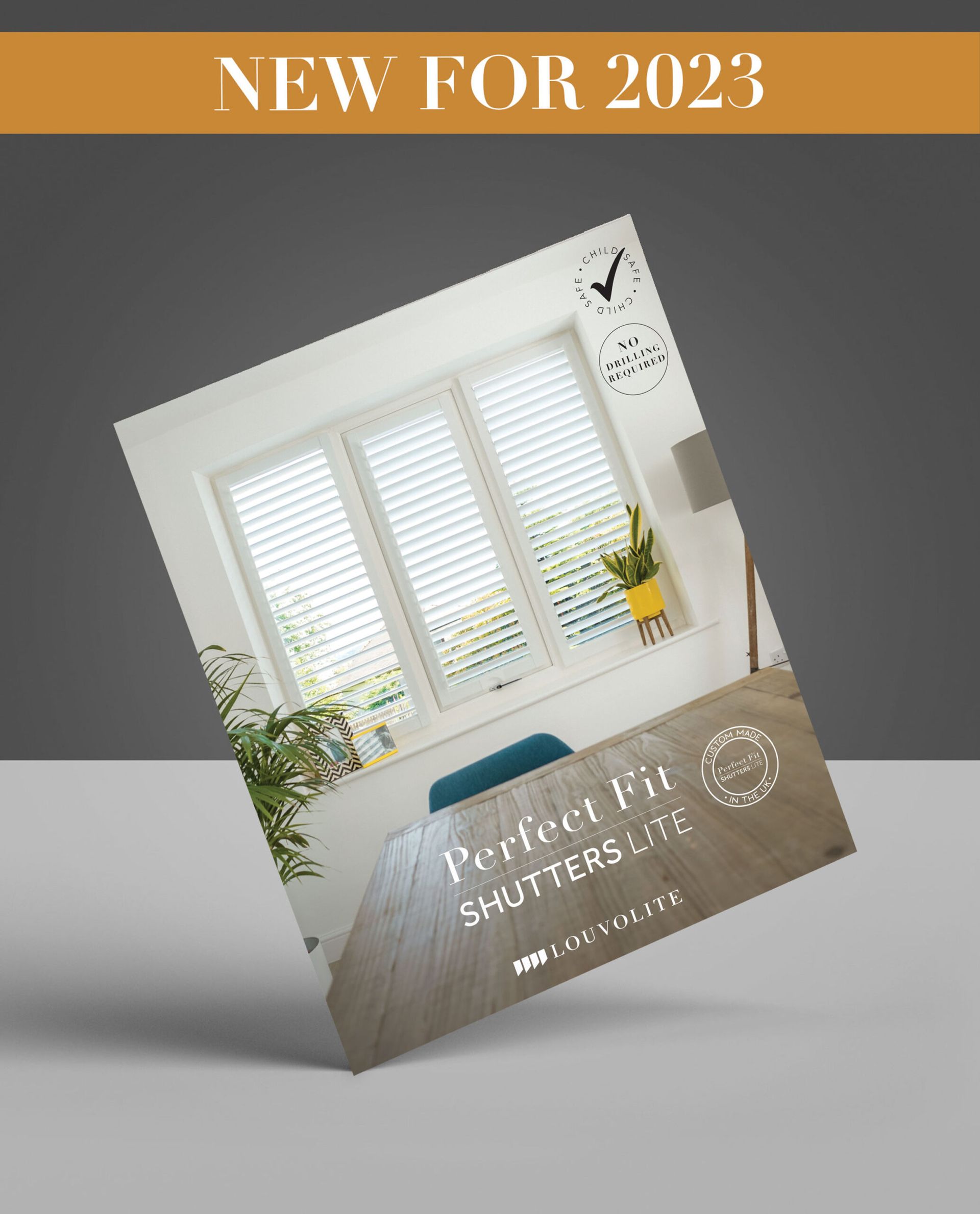 A brochure for new shutters for 2023 is sitting on a table.