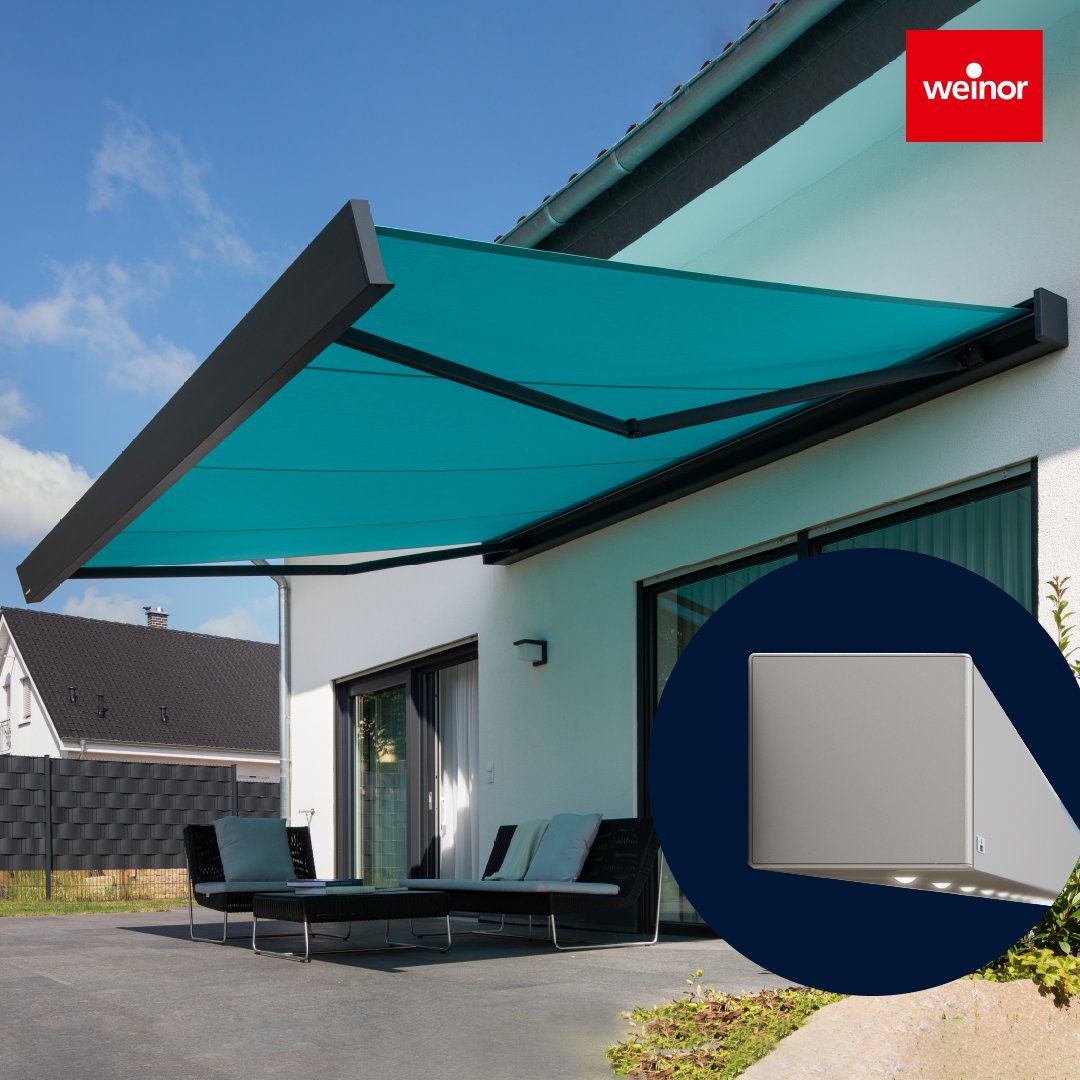 A house with a blue awning and a weinor logo