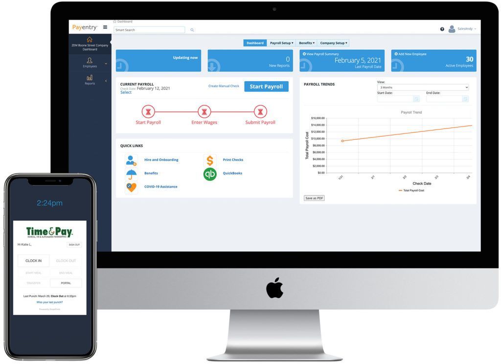 A phone is sitting next to a computer monitor.