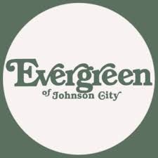 The evergreen of johnson city logo is in a circle on a green background.