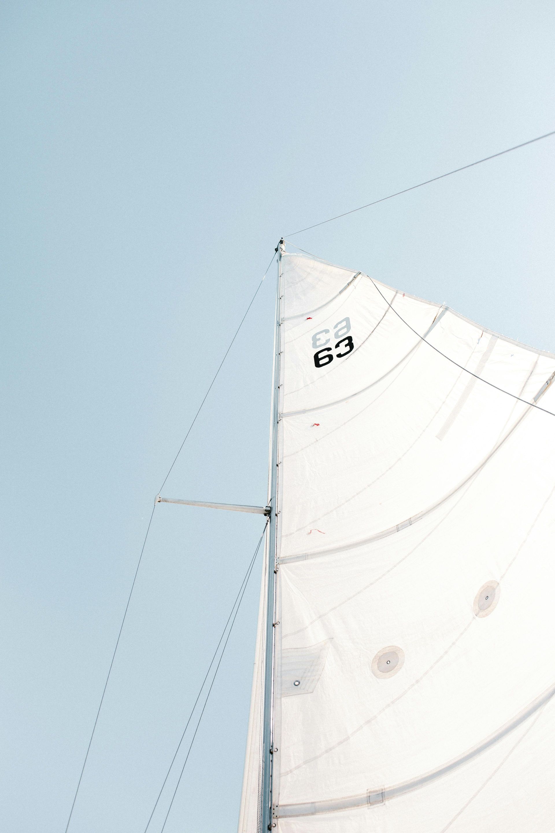 A sailboat sail with the number 69 on it