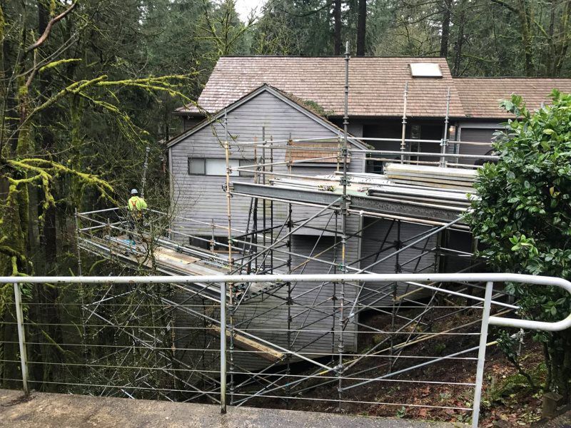 A house is being built with scaffolding around it.