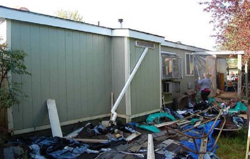 A mobile home that has been damaged by a storm