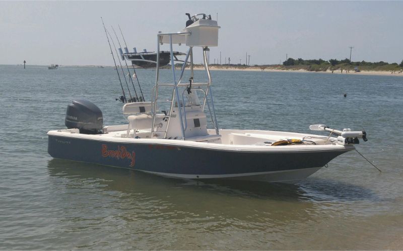 A boat with the word fishing on the side of it