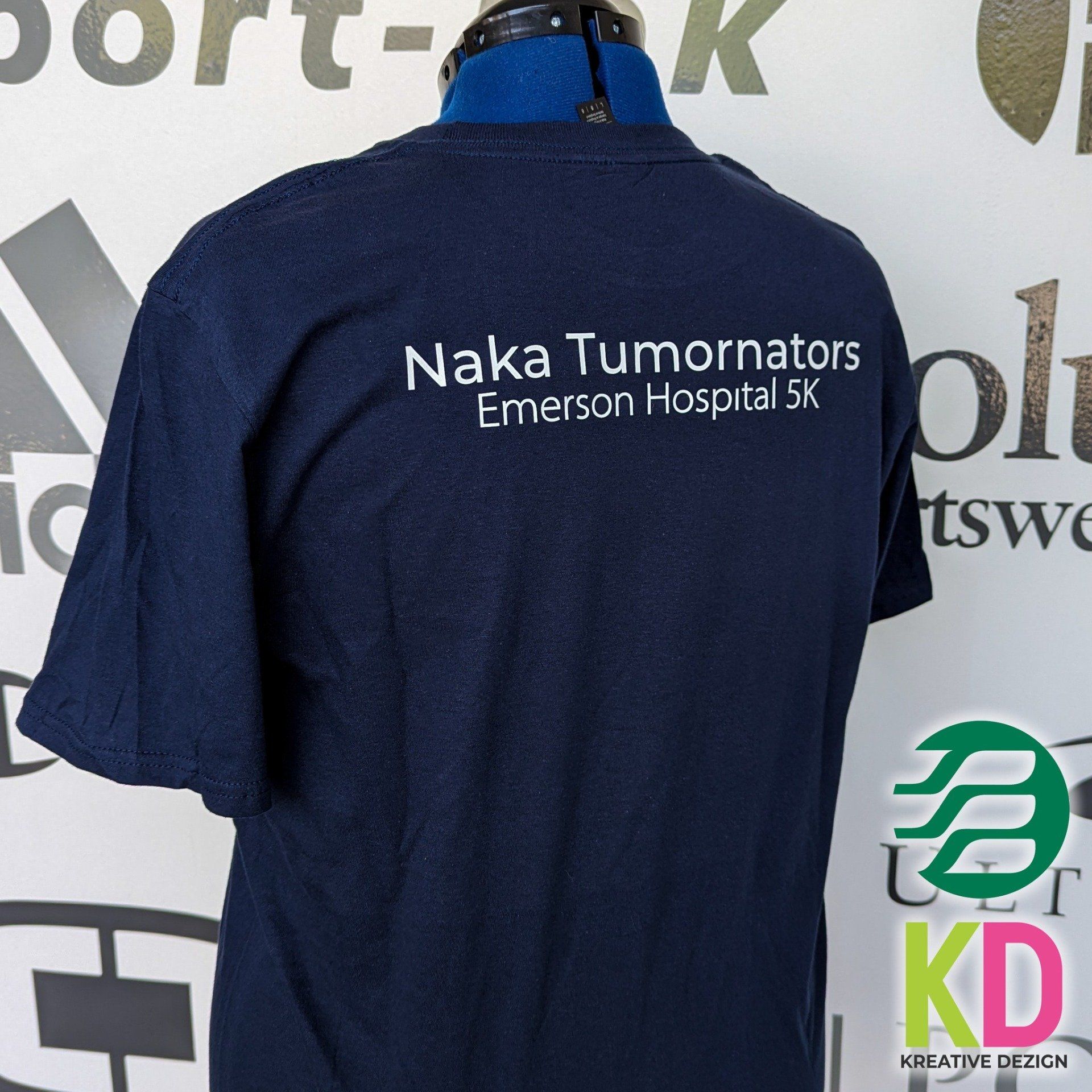 The back of a naka tumornators emerson hospital 5k t-shirt