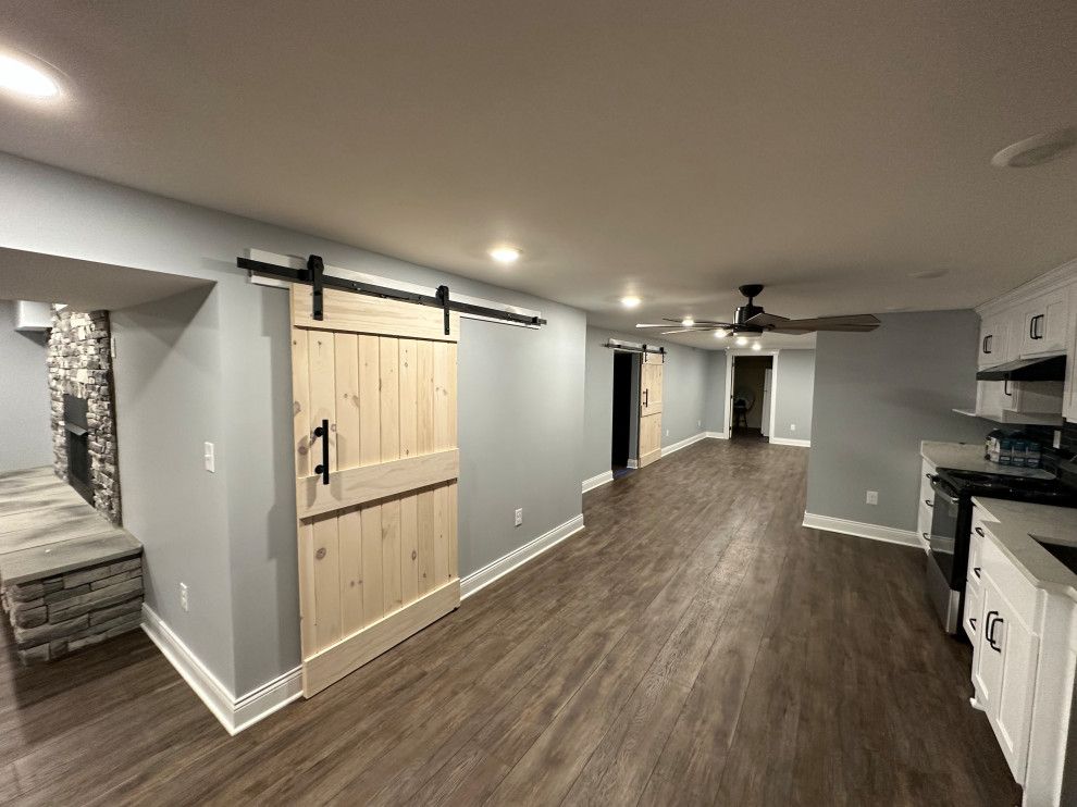 There is a sliding barn door in the middle of the room.