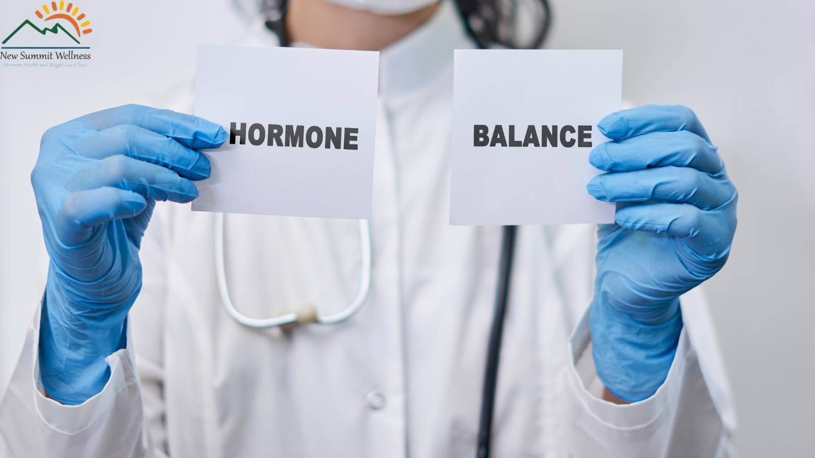 A doctor is holding a sign that says hormone balance.