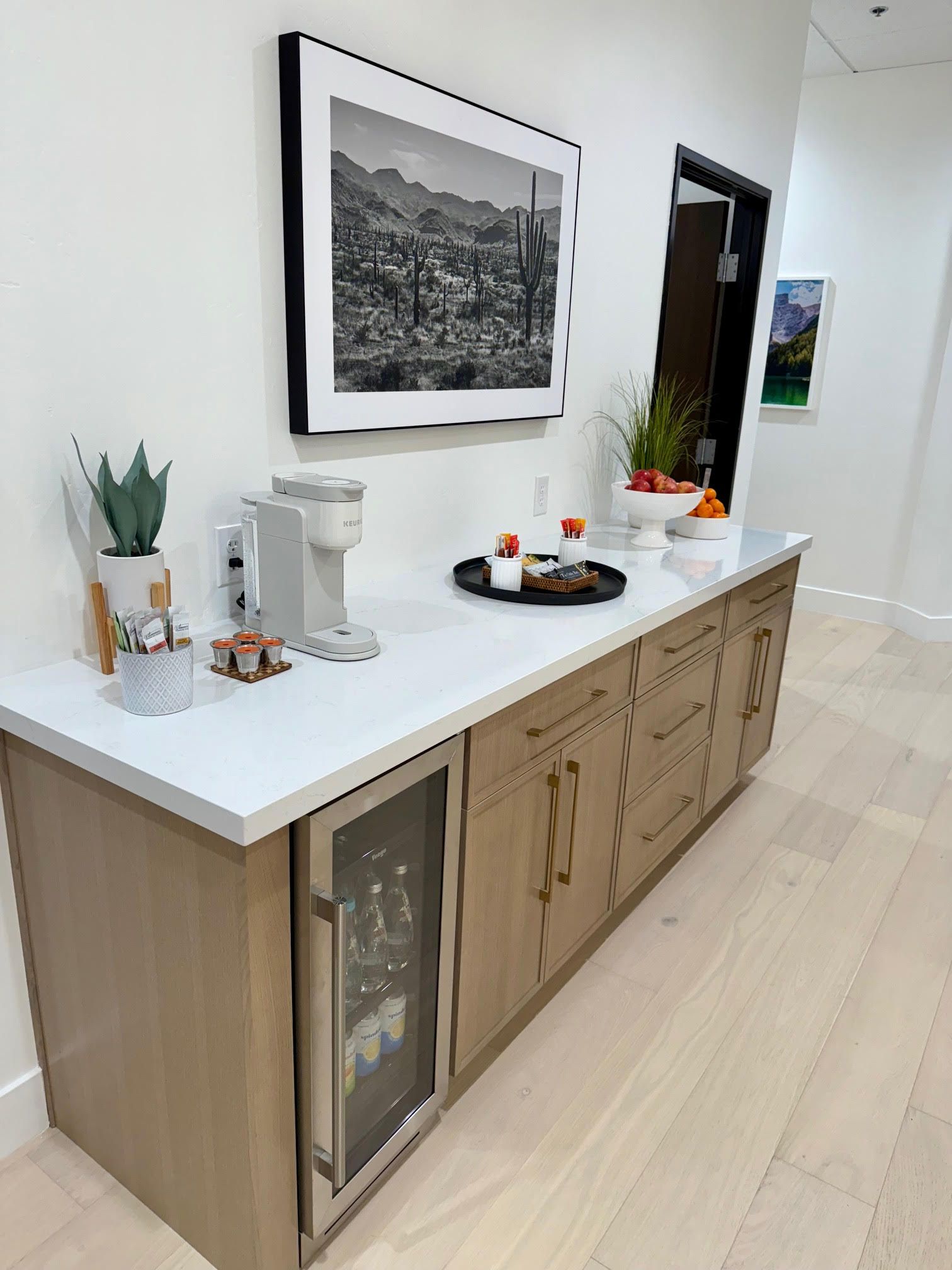 Organic snack and refreshment bar in modern concierge medicine waiting area at Sheridan James MD