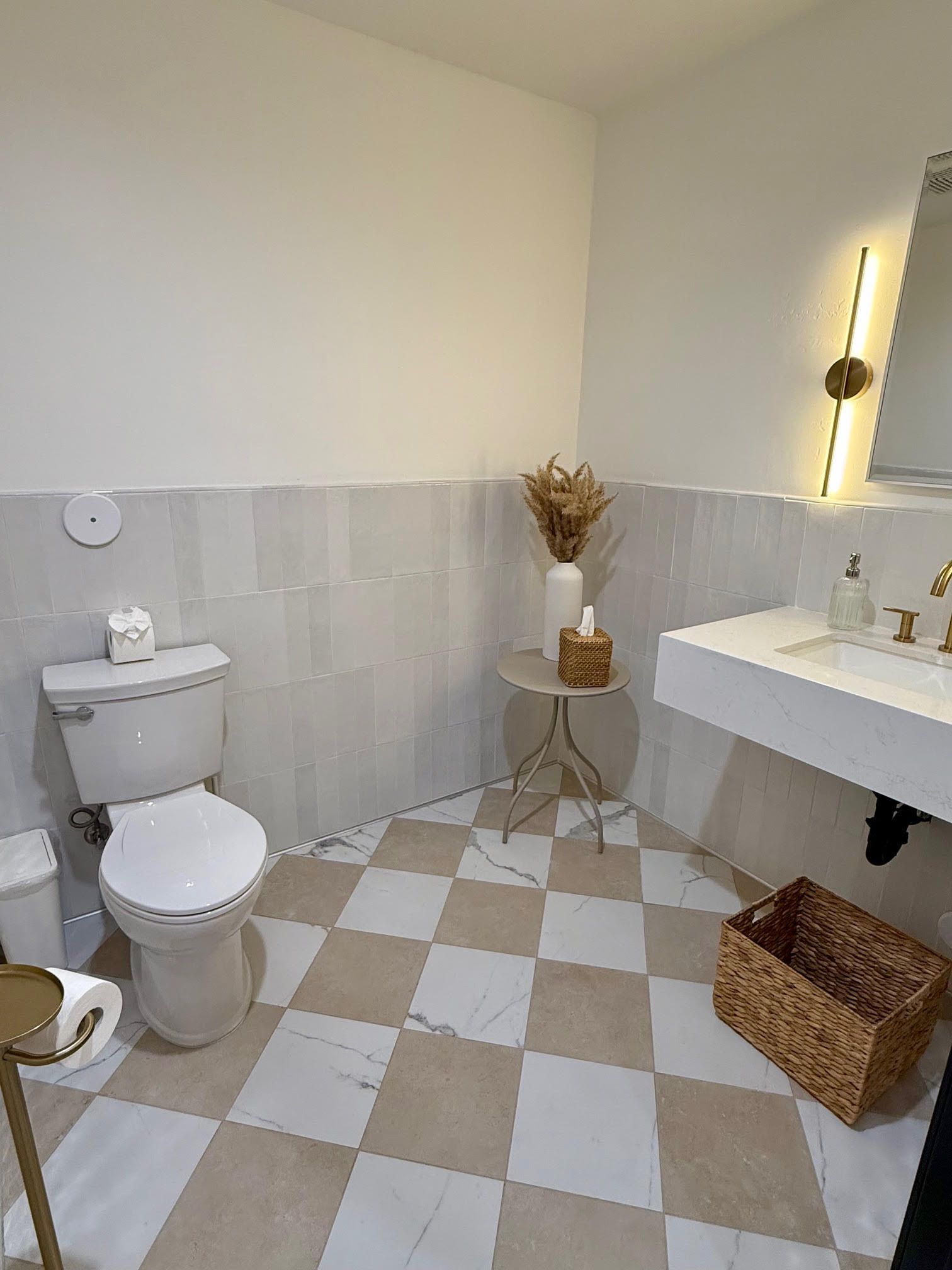 Private bathroom with modern, organic design at Dr. Sheridan James’s concierge medical office