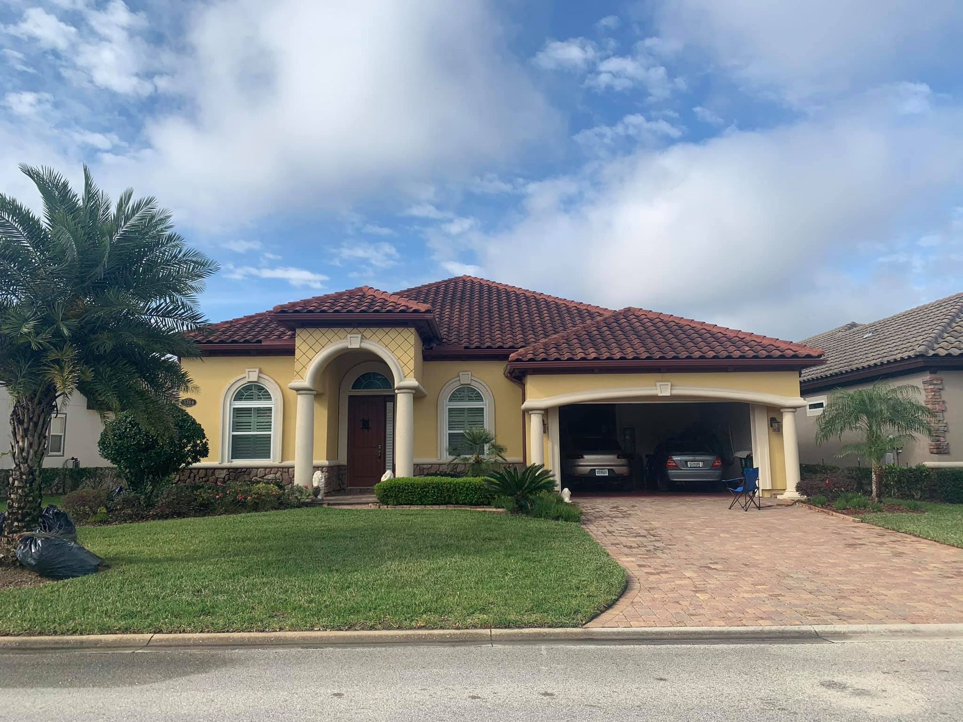 Yellow House with Red Tile Roof | Jacksonville, FL | Coastal Pressure Washing