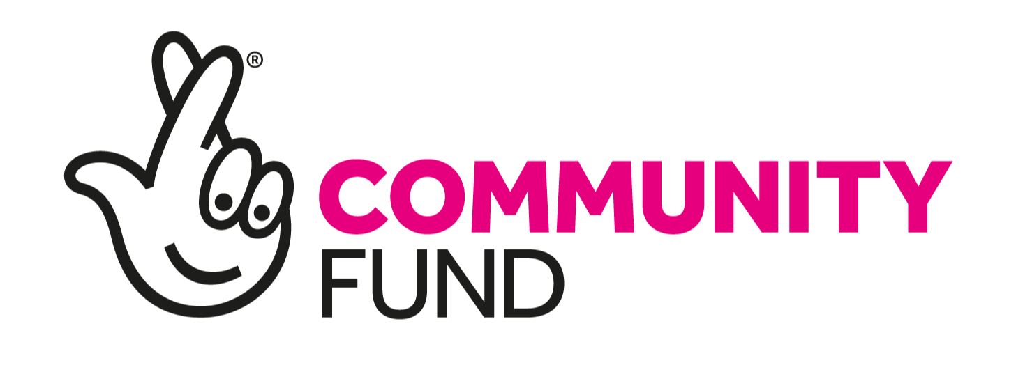 A logo for the community fund with a hand making a peace sign.