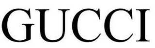 The word gucci is written in black on a white background.