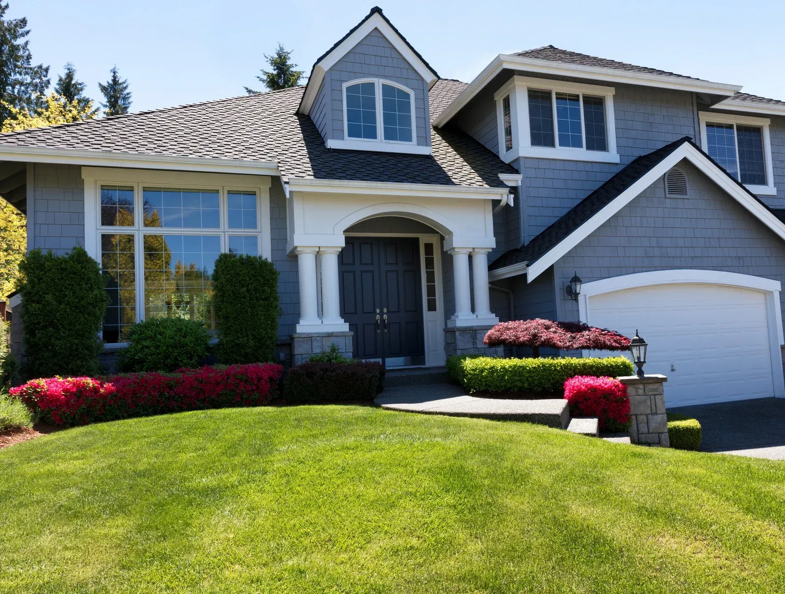 house with clean windows and yard