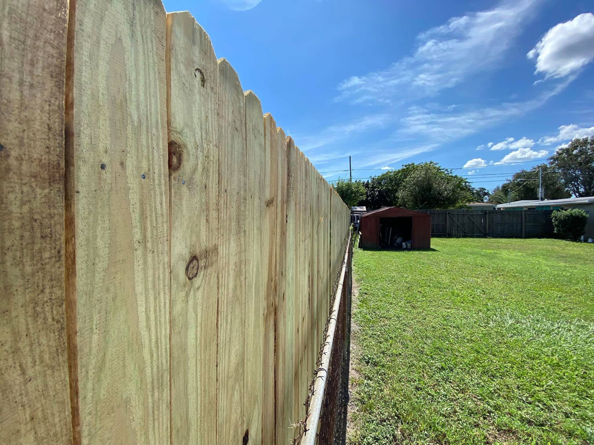 Side View Of Wooden Row | Tampa, FL | Bay Area Fencing Company