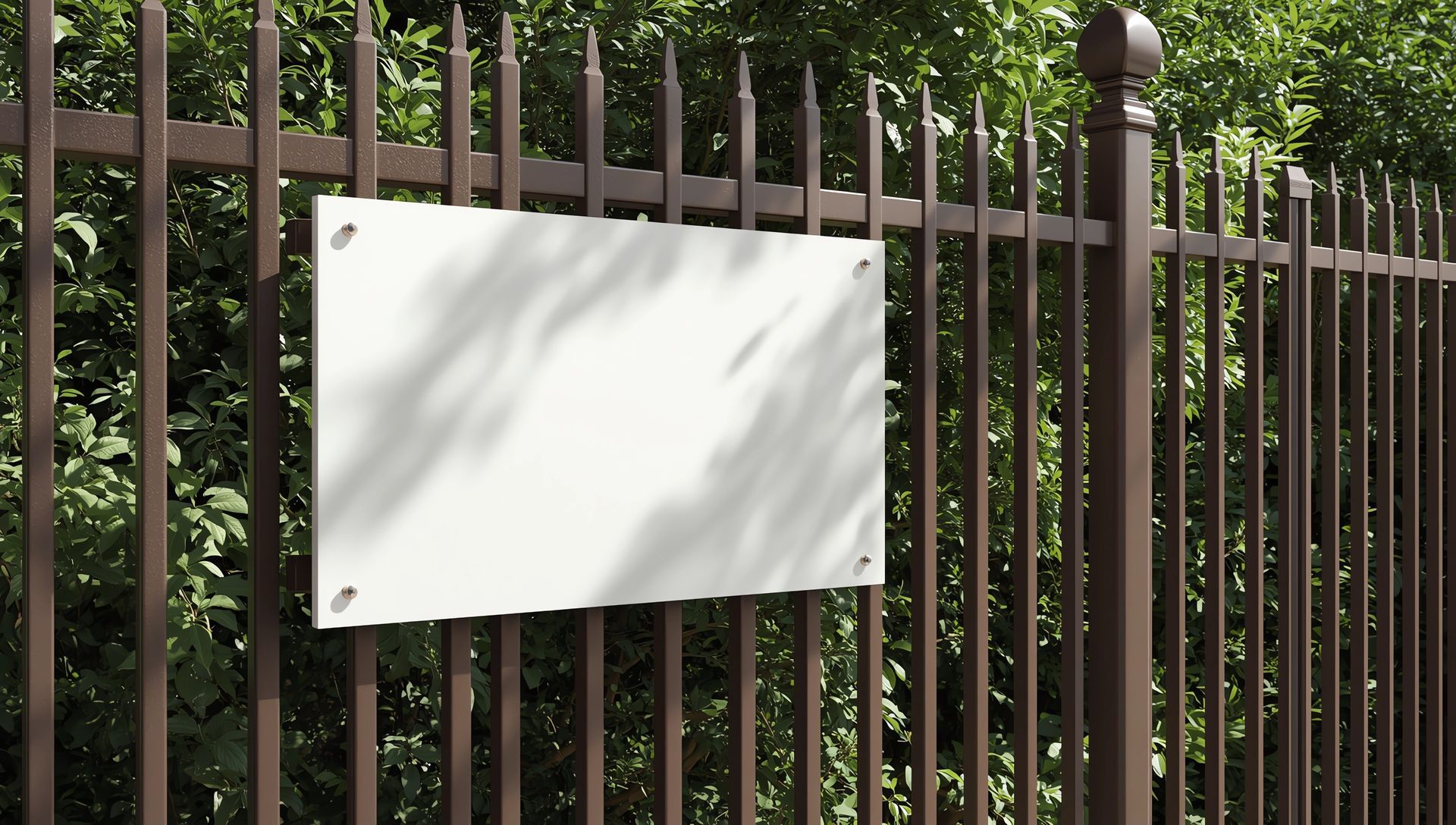 A high-quality metal security fence installed by a professional commercial fence company.