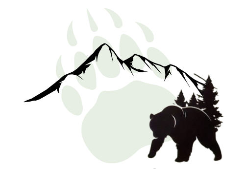 Black silhouette of a deer head with antlers centered between two mountain peaks, on a light brown background.