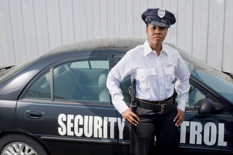 woman in security uniform