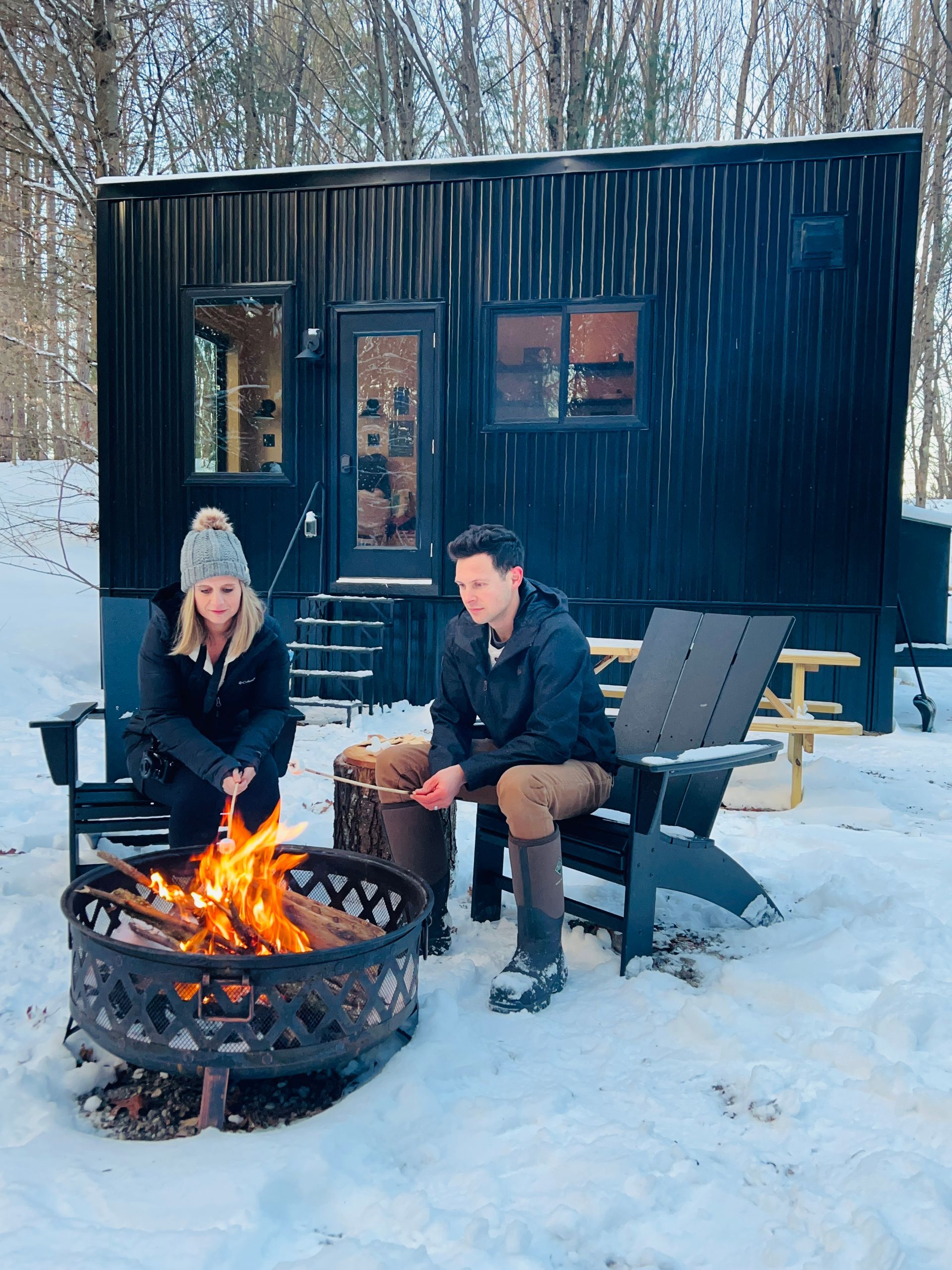 at the campfire roasting marshmallows at the fire at natures escape