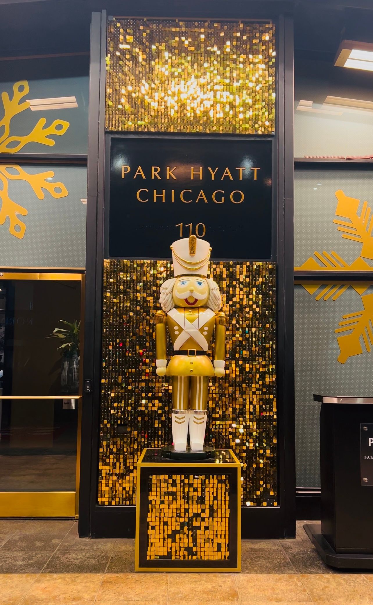 Park Hyatt Chicago. showcasing the entrance during the Christmas season, booked on points and miles 