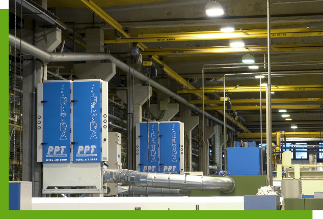 A factory with blue boxes that say ppt on them