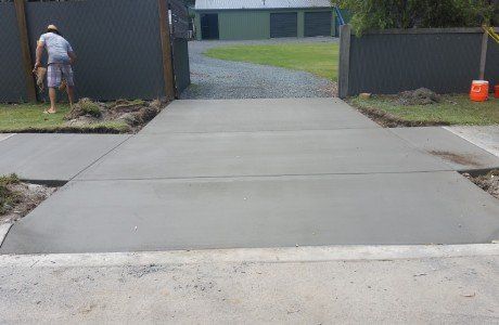 plain concrete driveway crossover